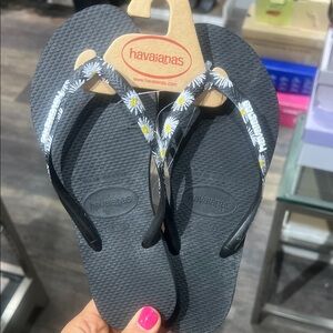 Havaianas Black Flip Flops with Floral Accents